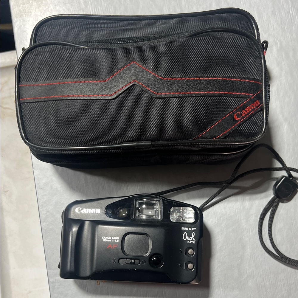 Canon Black 35mm Film Camera with Red Accents